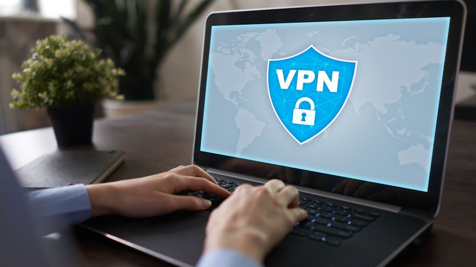 A laptop screen displaying a VPN logo