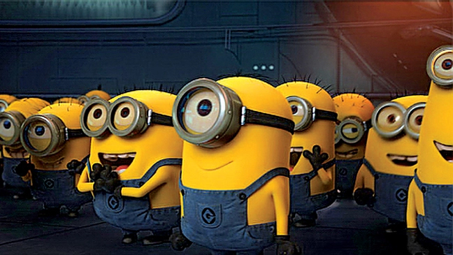 A still of the minions from Despicable Me all gathered together in a crowd.