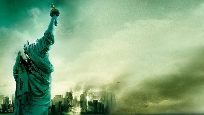 A still from the movie Cloverfield of the Statue of Liberty without a head and a damaged New York in the background.