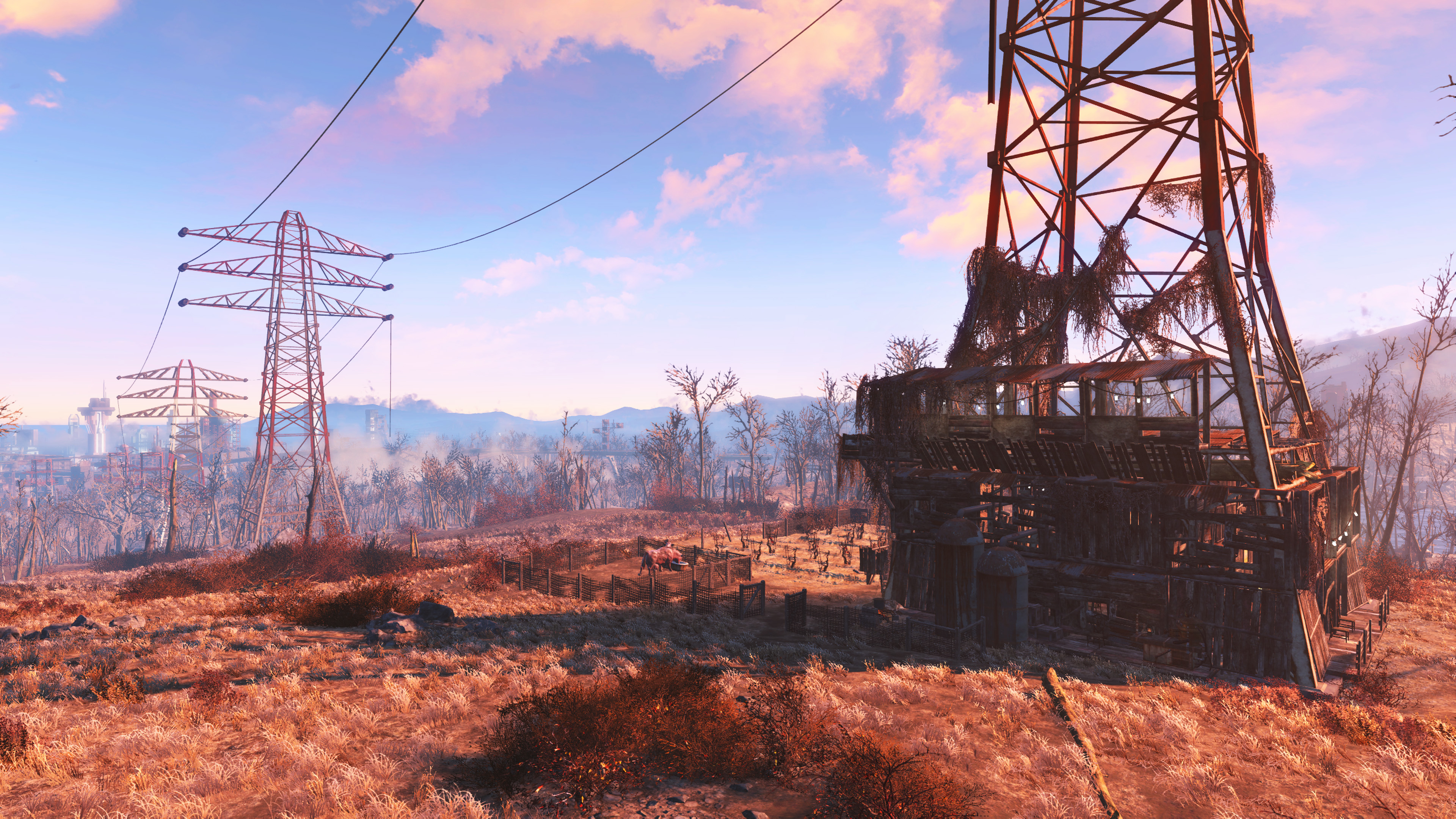Fallout barren landscape with pylons dotted into the distance