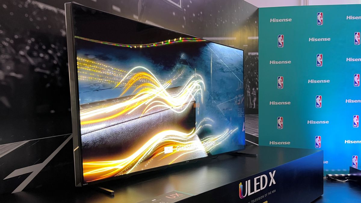Hisense ULED X TV with NBA logos in background on aqua banner