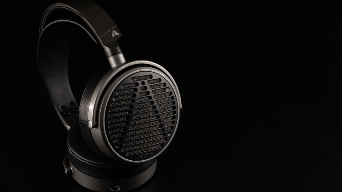 Audeze MM-100 headphones on black background