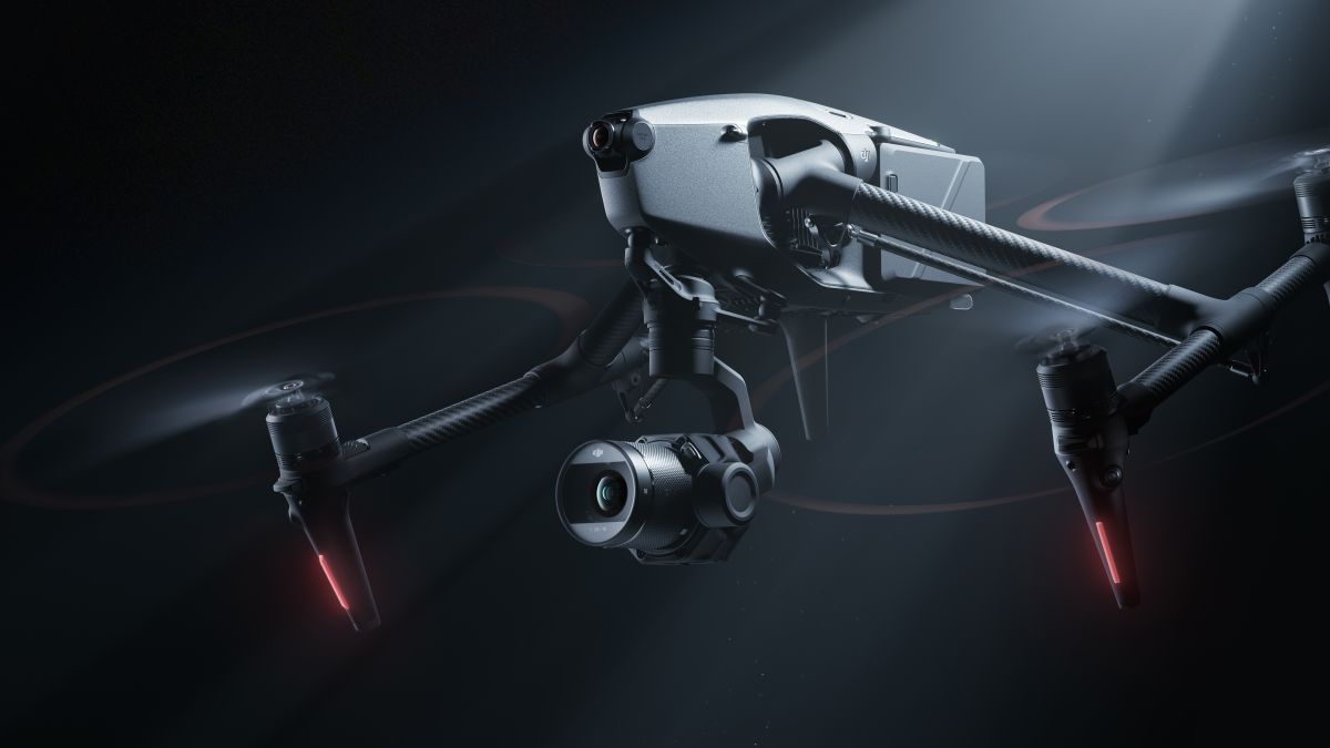 The DJI Inspire 3 drone flying in a dark room