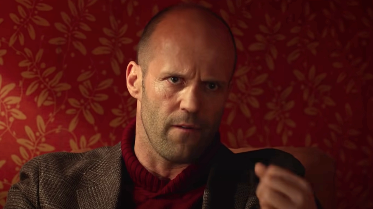 A still from the movie Spy, showing Jason Statham looking intense