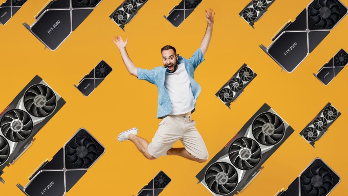 A man jumping for joy against a yellow background with falling graphics cards
