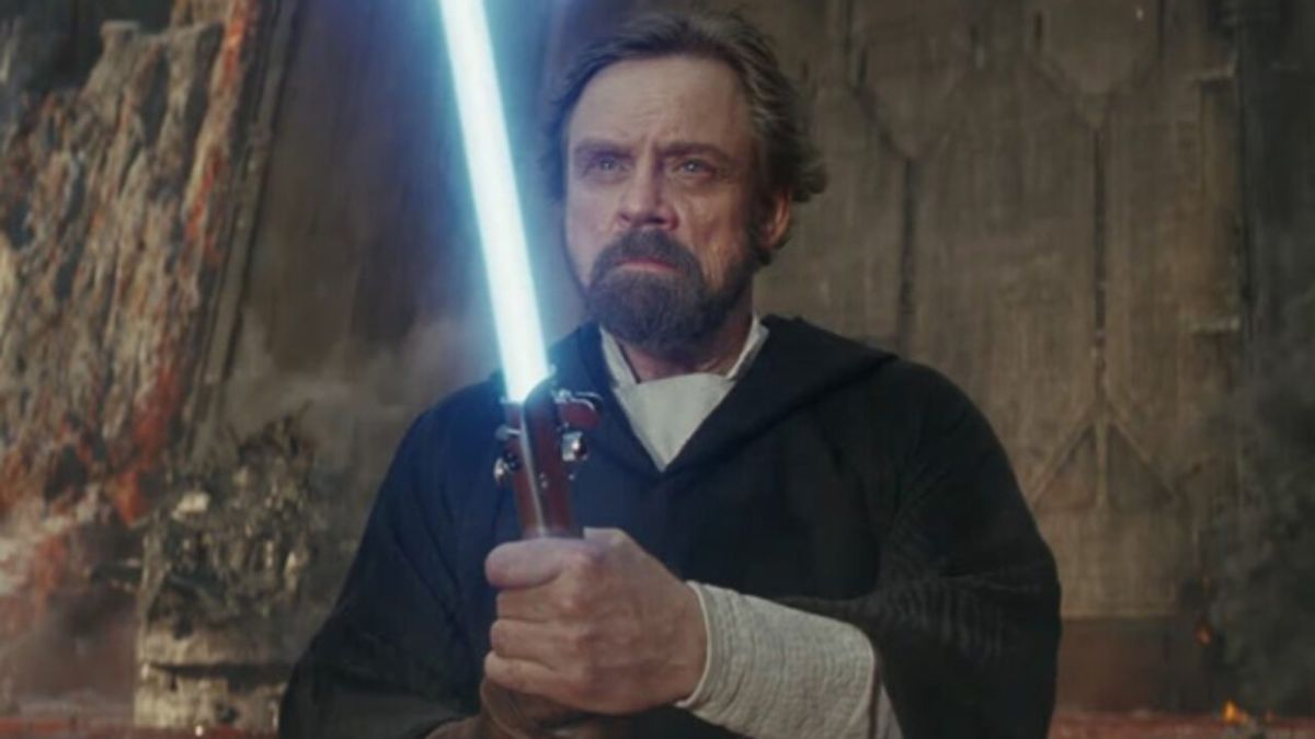 Luke Skywalker turns on his lightsaber in Star Wars: The Last Jedi